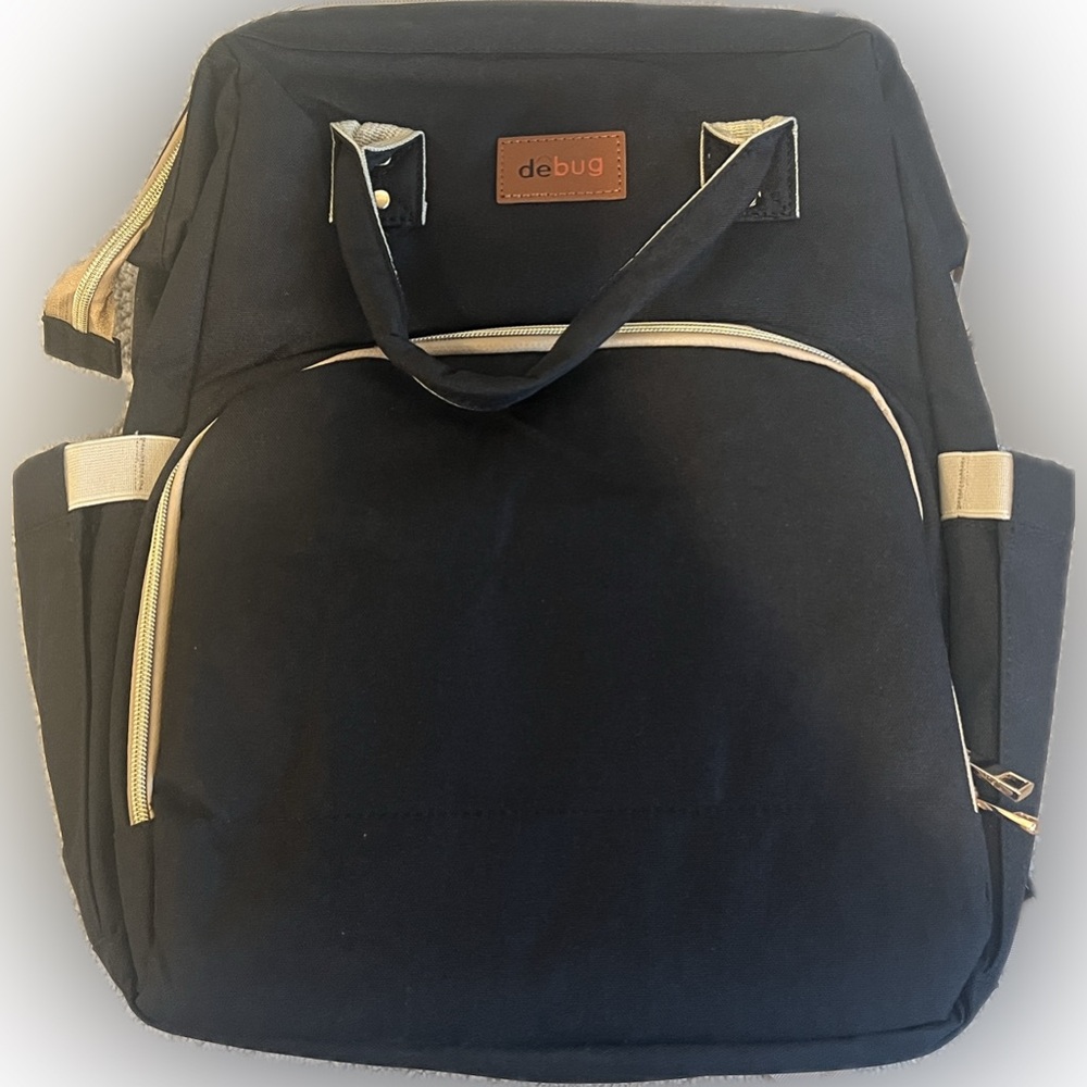deBug Diaper Bag | Built In Play Area | Black+Gold